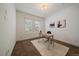 Bright office featuring a large window with white shutters and an elegant work space at 10632 Star Thistle Ct, Highlands Ranch, CO 80126