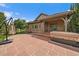 Outdoor patio space, with lush yard and covered hot tub at 10632 Star Thistle Ct, Highlands Ranch, CO 80126