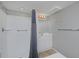 Clean bathroom with a shower, vanity, and neutral colors, offering a functional and updated space at 690 W Jamison Cir, Littleton, CO 80120