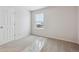 Simple bedroom with neutral carpeting and window at 1382 Rock Cliff Ave, Erie, CO 80516