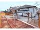 Landscaped backyard featuring a gazebo, with a well-maintained yard and privacy fence at 7470 Blue Water Ln, Castle Rock, CO 80108