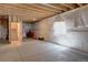 Spacious unfinished basement with exposed ceiling and concrete floor; ready to be personalized at 7470 Blue Water Ln, Castle Rock, CO 80108