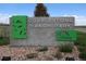 Cobblestone Ranch Park sign in Castle Rock, Colorado, surrounded by stones and greenery at 7470 Blue Water Ln, Castle Rock, CO 80108