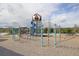 Playground featuring a climbing structure, slides, and a treehouse design for active outdoor fun at 7470 Blue Water Ln, Castle Rock, CO 80108