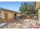 Inviting backyard with a mix of wooden deck, concrete patio and fenced yard at 11797 Keough Dr, Northglenn, CO 80233