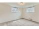 Cozy bedroom with gray carpet and two windows at 2965 S Birch St, Denver, CO 80222
