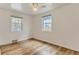 Bright bedroom with hardwood floors and a ceiling fan at 2965 S Birch St, Denver, CO 80222