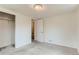 Bedroom with gray carpet, closet, and ensuite bathroom at 2965 S Birch St, Denver, CO 80222