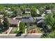 Beautiful home surrounded by lush greenery, featuring a well-manicured lawn and inviting curb appeal at 380 S Jersey St, Denver, CO 80224