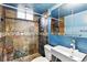 Stylish bathroom featuring tiled walk-in shower and modern fixtures and finishes at 380 S Jersey St, Denver, CO 80224