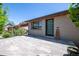 View of home's modern front door and stone-tiled front patio at 380 S Jersey St, Denver, CO 80224