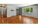 Living room with hardwood flooring and modern front door at 380 S Jersey St, Denver, CO 80224