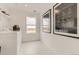 Bright laundry room with modern machines and ample natural light at 7291 Prairie Sage Pl, Littleton, CO 80125