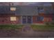 Charming brick townhome with a well-maintained lawn at 15139 E Wesley Ave, Aurora, CO 80014