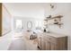 Bright living area with wood floors, floating shelves, and a stylish cabinet for elegant, modern living at 3932 Kalamath St, Denver, CO 80211