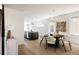 Open-concept living space with dining room and modern kitchen at 3932 Kalamath St, Denver, CO 80211