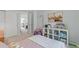 Well-organized bedroom showcasing a comfortable bed, white closet doors, and ' accessories at 2092 S Helena St # C, Aurora, CO 80013