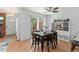 Dining area with sliding glass doors to the backyard, filled with natural light at 2092 S Helena St # C, Aurora, CO 80013