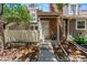 Inviting home exterior with brick accents and well-maintained landscaping at 2092 S Helena St # C, Aurora, CO 80013