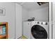 This laundry room features a modern, front-load washing machine and dryer at 2092 S Helena St # C, Aurora, CO 80013