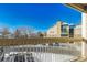 View from balcony overlooking parking lot and building at 4896 S Dudley St # 7-7, Littleton, CO 80123