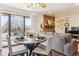 Bright dining area with a table and chairs, near sliding doors at 4896 S Dudley St # 7-7, Littleton, CO 80123