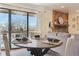 Dining area with table and chairs near balcony doors at 4896 S Dudley St # 7-7, Littleton, CO 80123