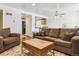 Spacious living room with two sofas and a coffee table at 4896 S Dudley St # 7-7, Littleton, CO 80123