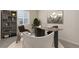 Well-lit home office space with modern decor and a comfortable work environment at 1462 Raindrop Way, Castle Rock, CO 80109