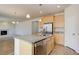Kitchen with granite island and stainless steel appliances at 1462 Raindrop Way, Castle Rock, CO 80109