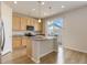 Kitchen with center island, granite countertops, and stainless steel appliances at 1462 Raindrop Way, Castle Rock, CO 80109