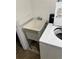 Shared laundry room with utility sink and appliances at 2401 S Gaylord St # 103, Denver, CO 80210