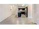 Open concept kitchen and living area with modern finishes at 4100 Albion St # 504, Denver, CO 80216