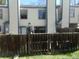 Enclosed backyard with a wooden fence, offering privacy and space for outdoor activities at 453 S Kittredge St # D, Aurora, CO 80017