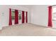 Spacious bedroom with neutral carpet, large windows, and bright natural light at 12825 Forest Way, Thornton, CO 80241
