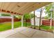 Covered outdoor patio area with view of fenced backyard at 12825 Forest Way, Thornton, CO 80241