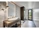 Modern bathroom with a unique vessel sink, decorative lighting, and a glass-enclosed shower at 294 Gold Run Rd, Breckenridge, CO 80424