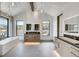 Spacious bathroom with dual vanities, modern fixtures, a soaking tub, and mountain views at 294 Gold Run Rd, Breckenridge, CO 80424