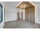 Spacious bedroom with wood floors, recessed lighting, and natural light from large windows at 294 Gold Run Rd, Breckenridge, CO 80424
