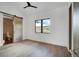 Bedroom with hardwood floors, barn door, and mountain views at 294 Gold Run Rd, Breckenridge, CO 80424