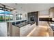 Modern kitchen with island, gas range, and mountain views at 294 Gold Run Rd, Breckenridge, CO 80424