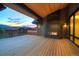 Cozy outdoor fireplace on the deck, offering a warm and inviting space at 294 Gold Run Rd, Breckenridge, CO 80424