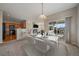 Inviting dining area adjacent to the kitchen, with sliding glass doors to the patio for seamless indoor-outdoor living at 74 Whitehaven Cir, Highlands Ranch, CO 80129