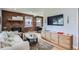 Cozy living room with brick fireplace, comfortable seating, and stylish decor at 2625 S Linley Ct, Denver, CO 80219