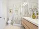 Modern bathroom featuring a frameless shower, stylish vanity, and sleek fixtures at 4603 W 33Rd Ave, Denver, CO 80212