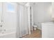 Bright bathroom with tub/shower combo, and ample storage space at 4603 W 33Rd Ave, Denver, CO 80212