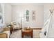 Cozy room with a plush rug, comfortable seating, a teepee and ample natural light from a shuttered window at 4603 W 33Rd Ave, Denver, CO 80212