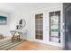 Charming entryway with hardwood floors, a desk, and a door leading to the outside at 4603 W 33Rd Ave, Denver, CO 80212