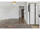 Bright living room with modern laminate flooring and neutral wall paint at 4825 Estes St, Arvada, CO 80002