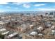 Breathtaking aerial view of the city skyline with mountain views on a sunny day at 1699 N Downing St # 409, Denver, CO 80218